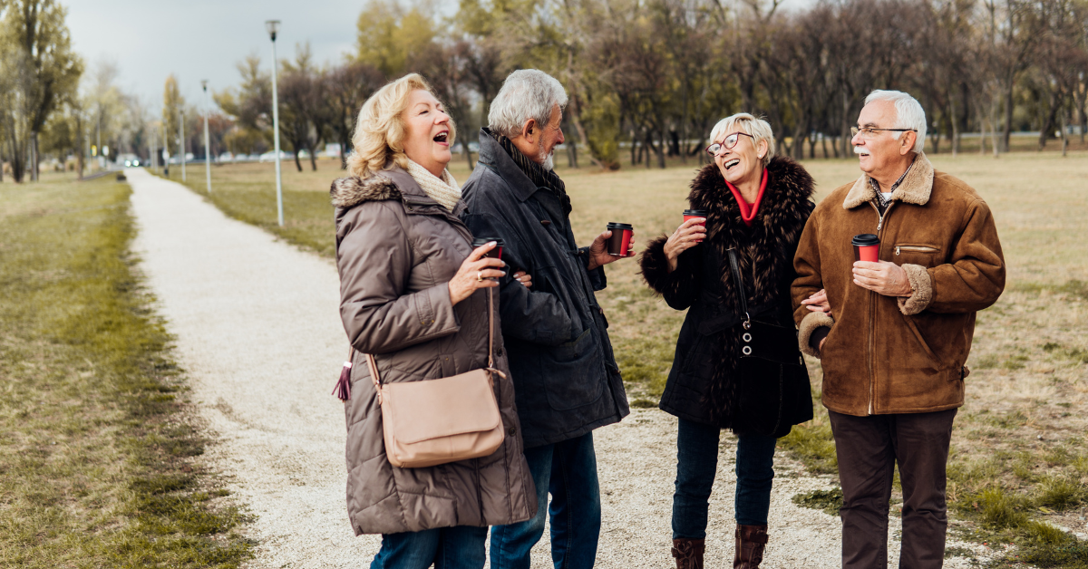 group of over 60s enjoying a coffee and a chat