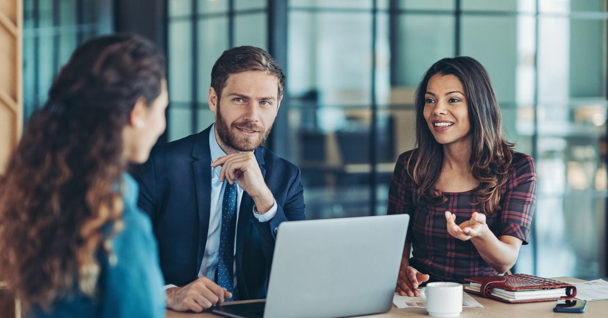 market researchers discussing customer list recruitment