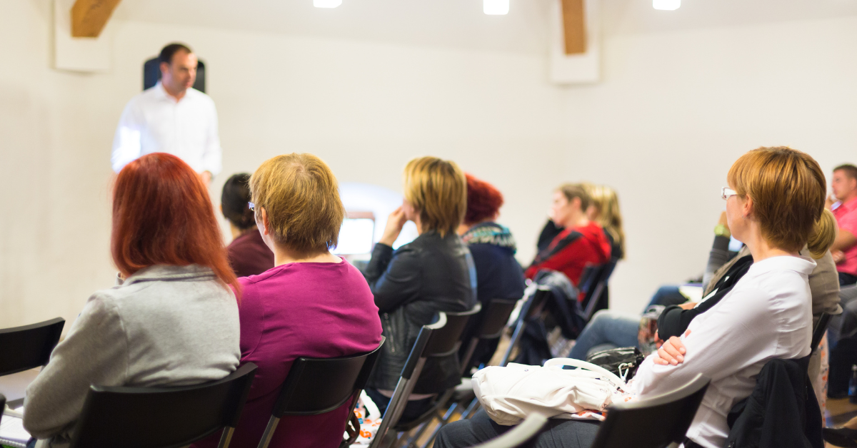 Researchers facilitating a collaborative stakeholder session