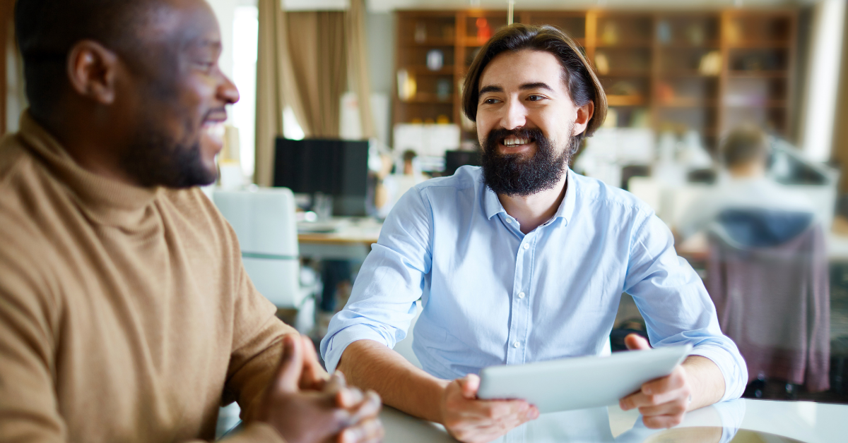 Researchers collecting customer feedback through intercept interviews
