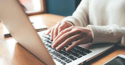 Woman filling in market research screener following validation call
