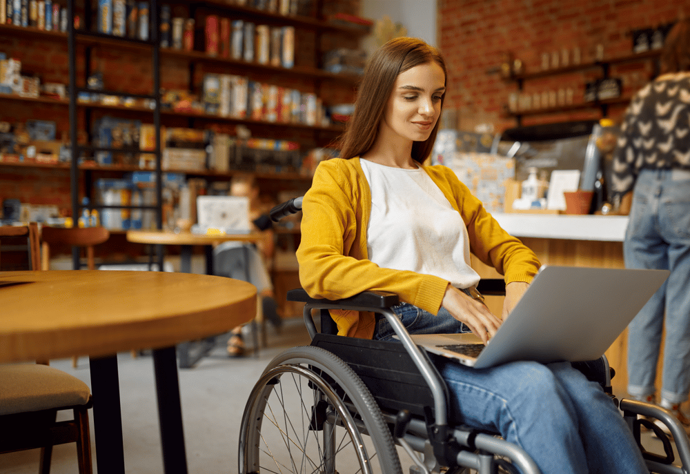 A young woman in a wheelchair taking part in market research, as an example of making research accessible.