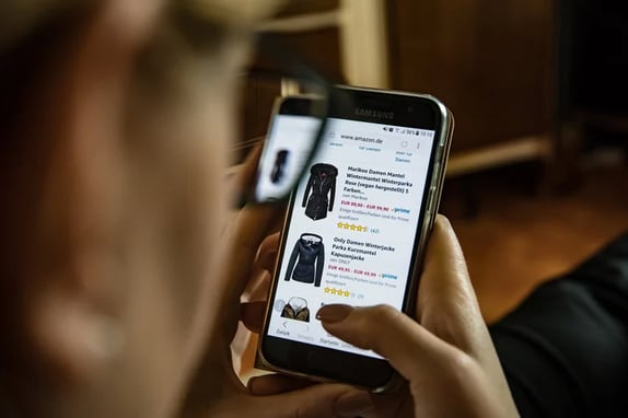 shopping on the phone looking at fashion