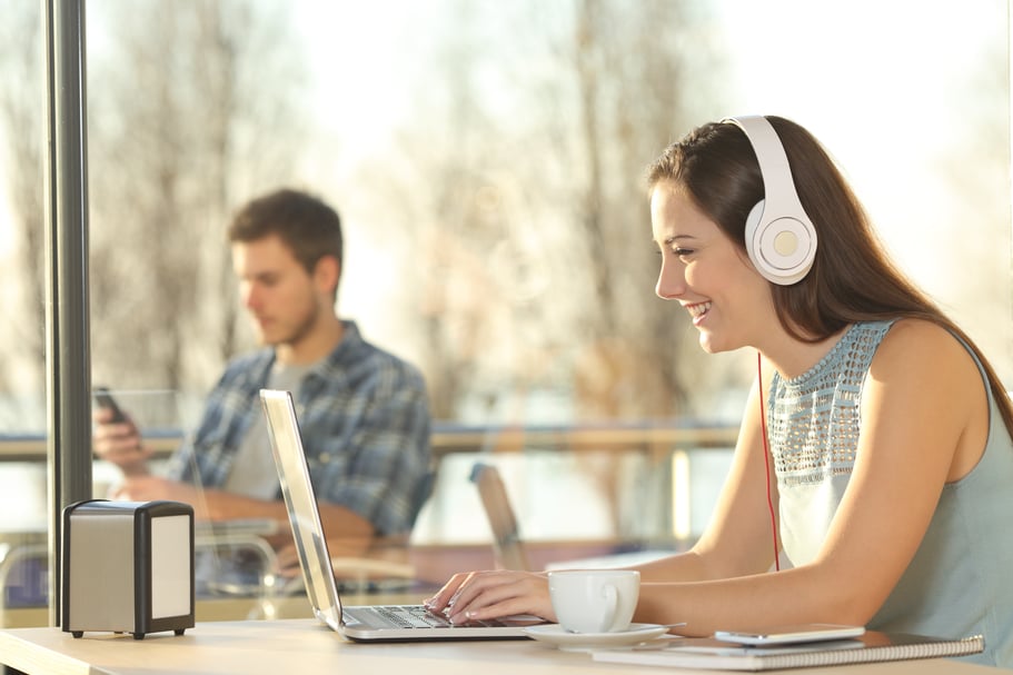 Woman taking part in online focus groups on her laptop