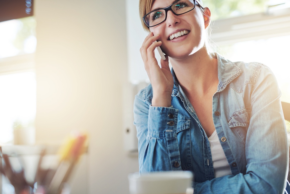 Woman on the phone as part of Qualitative Fieldwork