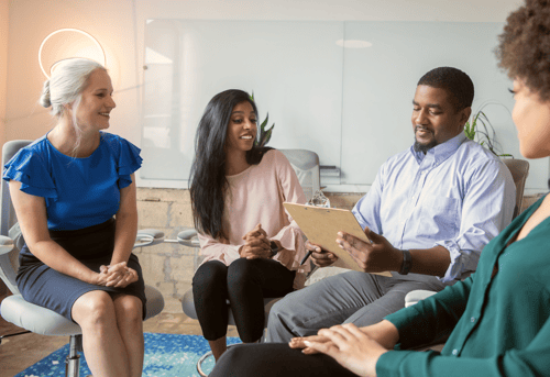 A moderator with a focus group.