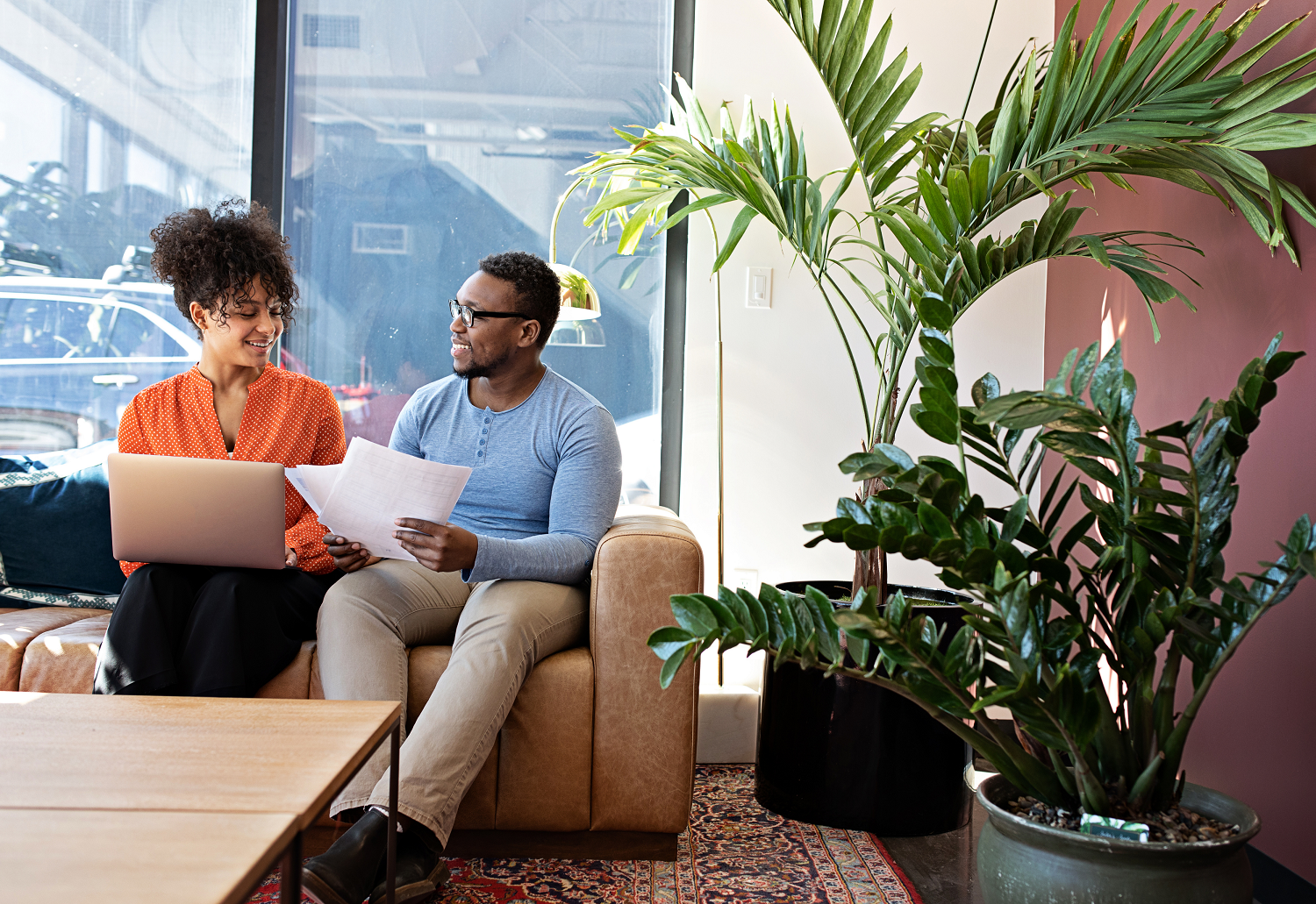 Two colleagues devising their market research recruitment agency brief, representing how to write a market research brief. 