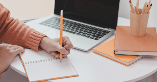 person preparing to write market research screener