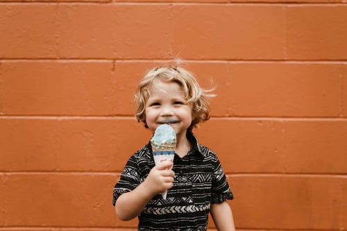 child holding treat