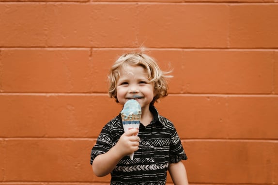 child holding treat