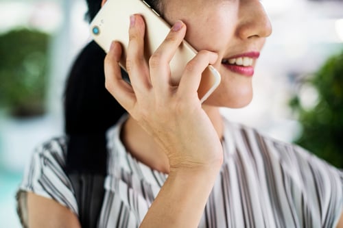 Person on phone regarding market research respondent validation