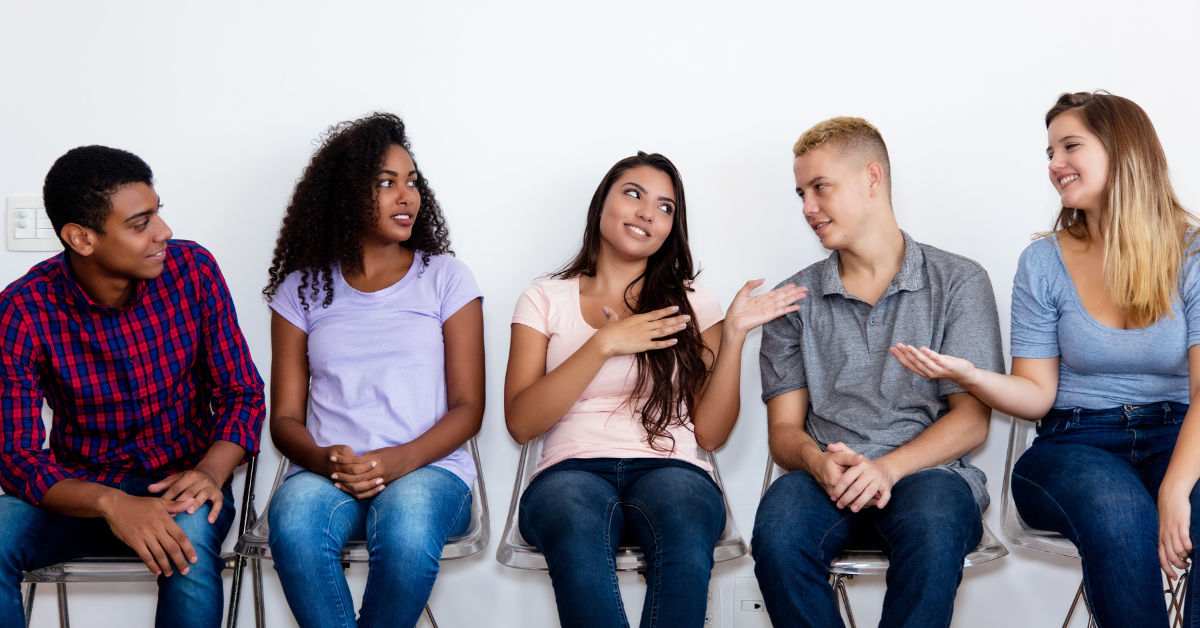 group of young people talking
