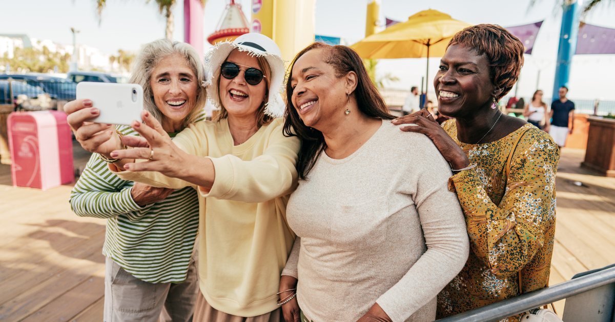 group of over 60s with smartphone