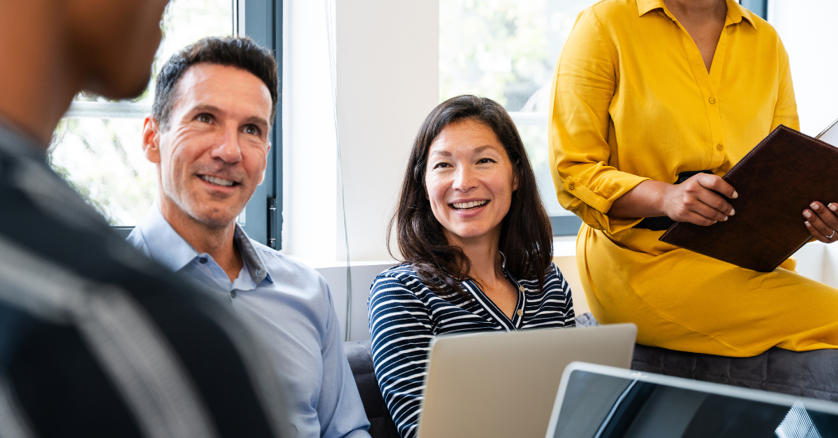 Diverse charity stakeholders participating in qualitative market research discussion