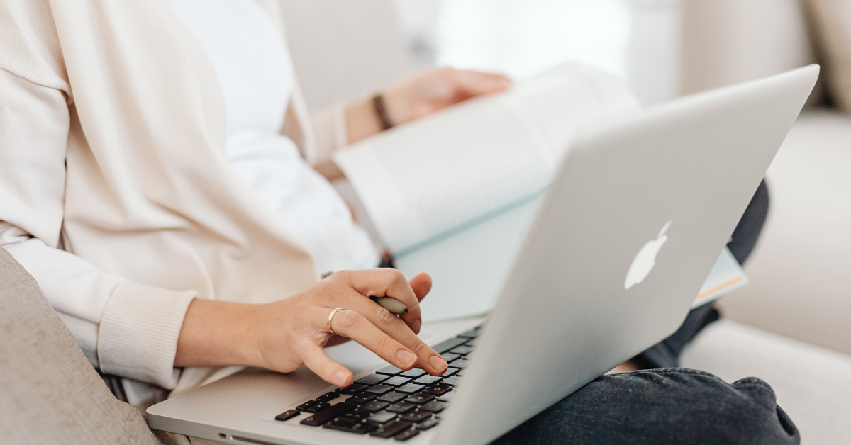 Researcher analysing participant data during online qualitative research session.