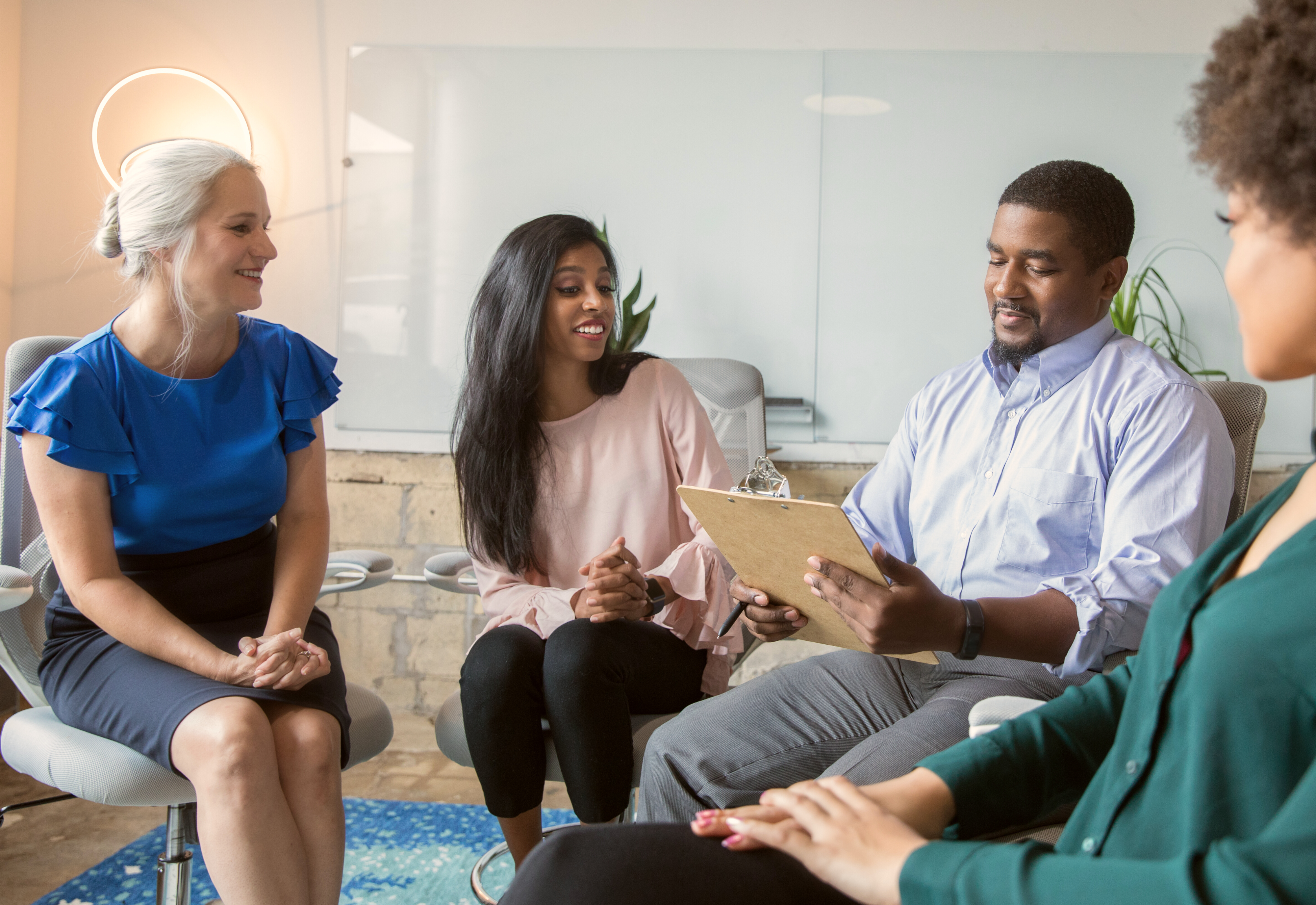 A moderator with a focus group.