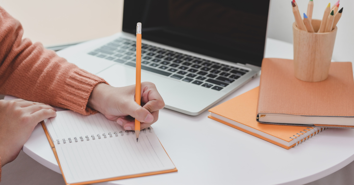 person preparing to write market research screener